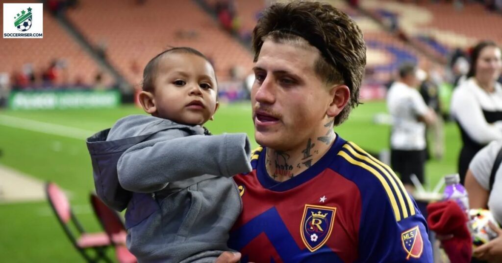 Diego Luna having a light moment with his son after the match