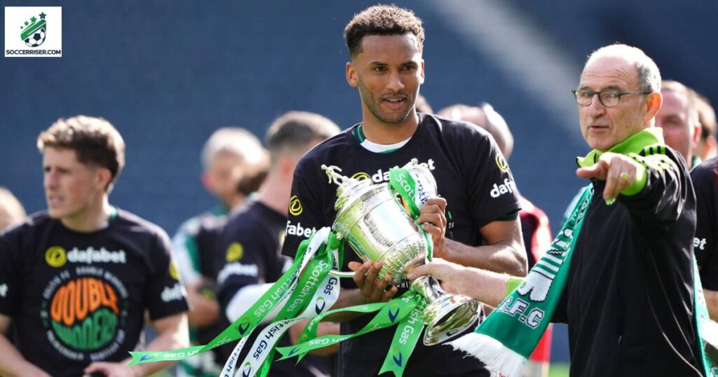 Auston Trusty and Celtic manager Martin O'Neill with the Scottish Cup trophy